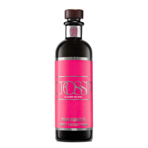 A bottle of Crossip Pure Hibiscus non-alcoholic bitters with a pink label and a wooden cap.